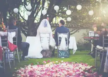 bride and groom having wedding ceremony