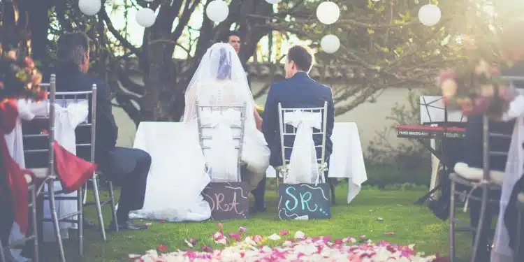 bride and groom having wedding ceremony